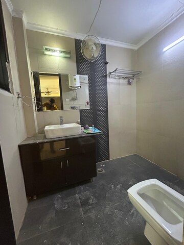 Bathroom in 3 BHK Apartment at Freedom Fighters Enclave – for Rent