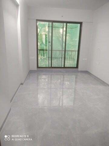 Living Room in 1 BHK Apartment at Unique Estate, Mira Road – for Sale