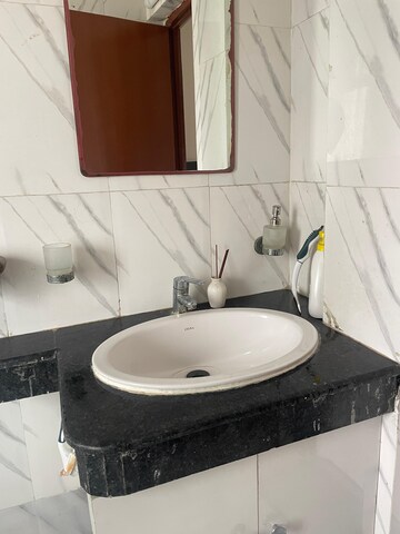 Bathroom in 2 BHK Apartment at Nimbus The Golden Palm, Sector 168 – for Rent