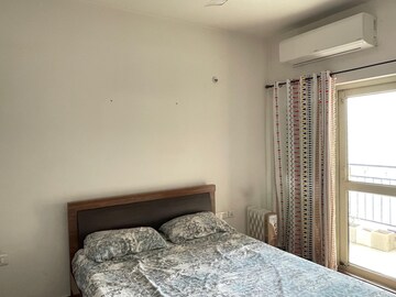 Bedroom in 2 BHK Apartment at Nimbus The Golden Palm, Sector 168 – for Rent