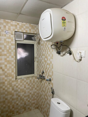 Bathroom in 2 BHK Apartment at Nimbus The Golden Palm, Sector 168 – for Rent