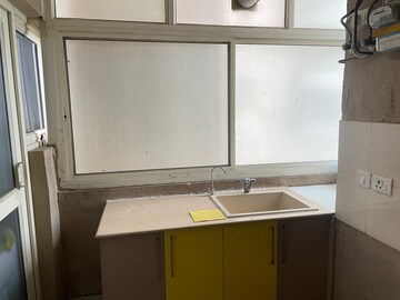 Kitchen in 2 BHK Apartment at Nimbus The Golden Palm, Sector 168 – for Rent
