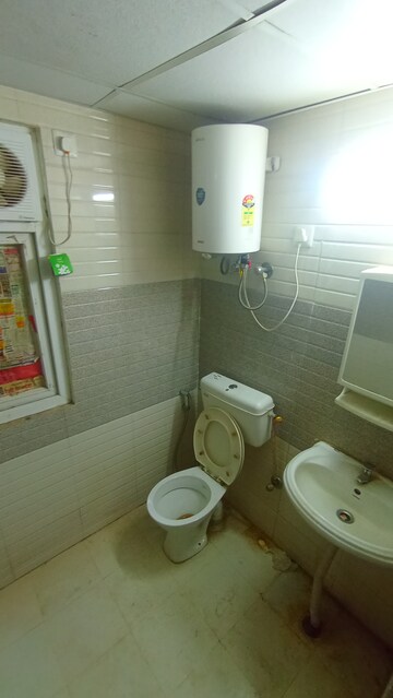Bathroom in 2 BHK Apartment at Signature Global Orchard Avenue, Sector 93 – for Rent