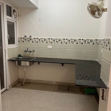 Kitchen in 2 BHK Apartment at Signature Orchard Avenue 2, Hayatpur – for Rent