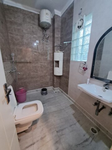 Bathroom in 4 BHK Builder Floor at Sector 15 – for Rent