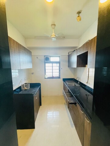 Kitchen in 2 BHK Apartment at Sheth Vasant Oasis, Andheri East – for Rent