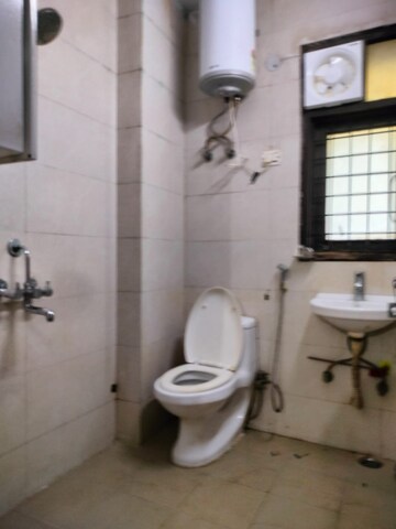 Bathroom in 1 RK Builder Floor at Ansal Sushant Lok I, Sector 43 – for Rent