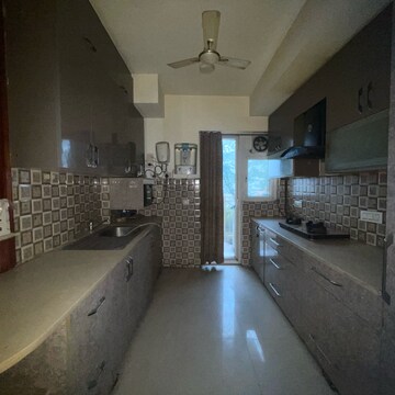 Kitchen in 3 BHK Apartment at Emaar Gurgaon Greens, Sector 102 – for Rent