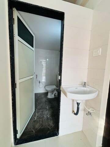 Bathroom in 2 BHK Apartment at Pinnacle Nano City, Joveli – for Sale
