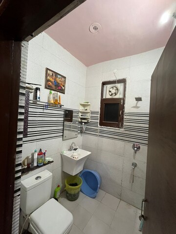 Bathroom in 3 BHK Builder Floor at Guru Nanak Enclave, Dhakoli Village – for Sale