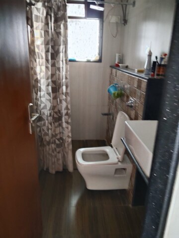 Bathroom in 2 BHK Apartment at Raj Gaurav CHS, Dadar West – for Rent