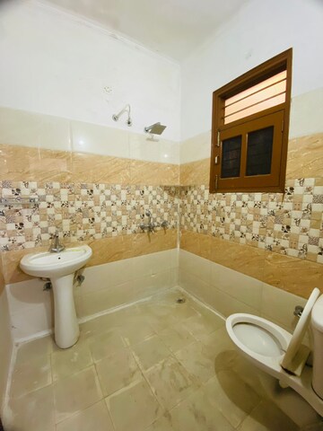 Bathroom in 2 BHK Apartment at Sunny Enclave – for Rent