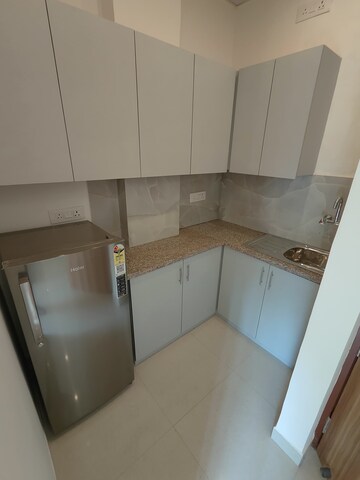 Kitchen in 1 RK Builder Floor at Ansal Sushant Lok I, Sector 43 – for Rent