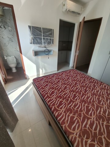 Bedroom in 1 RK Builder Floor at Ansal Sushant Lok I, Sector 43 – for Rent
