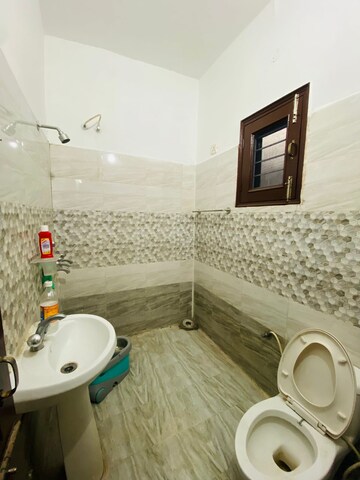 Bathroom in 2 BHK Apartment at Sunny Enclave – for Rent