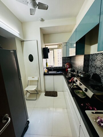 Kitchen in 2 BHK Apartment at Acme Ozone, Manpada – for Sale
