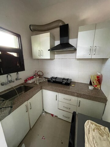 Kitchen in 1 BHK Apartment at Dhakoli Village – for Rent