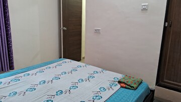 Bedroom in 2 BHK Apartment at Puraniks Kavya Dhara CHS, Dhokali – for Rent