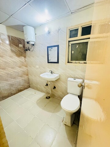 Bathroom in 3 BHK Apartment at Antriksh Golf View, Sector 78 – for Rent