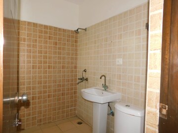 Bathroom in 3.5 BHK Apartment at Aims Golf City, Sector 75 – for Rent