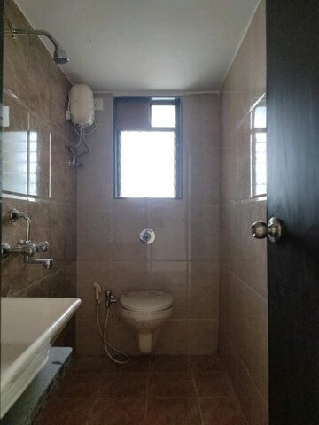 Bathroom in 2 BHK Apartment at Rustomjee Avenue L1, Virar West – for Rent