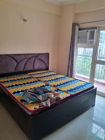Bedroom in 2 BHK Apartment at Aims Golf City, Sector 75 – for Rent