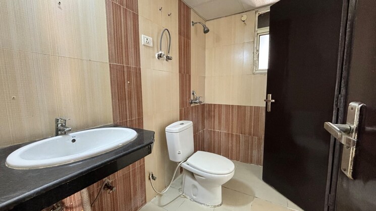 Bathroom, griha-pravesh 3 Bedroom 1971 Sq.Ft. Apartment In Sector 77 Noida 8063499