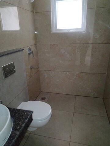 Bathroom in 3 BHK Apartment at Maya Green Lotus Utsav, International Airport Road – for Rent