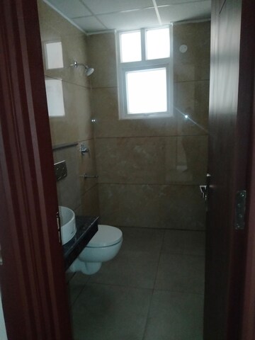 Bathroom in 3 BHK Apartment at Maya Green Lotus Utsav, International Airport Road – for Rent