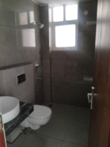 Bathroom in 3 BHK Apartment at Maya Green Lotus Utsav, International Airport Road – for Rent