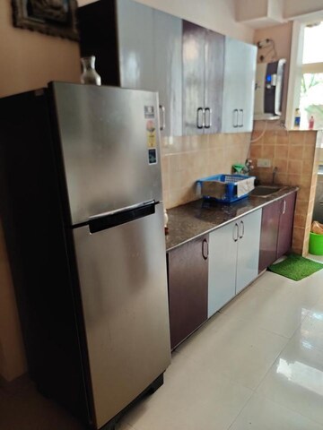 Kitchen in 2 BHK Apartment at Aims Golf City, Sector 75 – for Sale