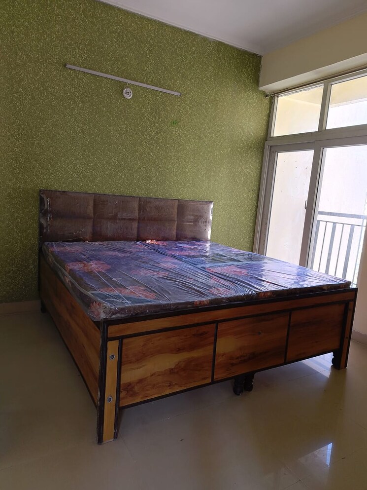 Bedroom, aims-golf-city 2 Bedroom 950 Sq.Ft. Apartment In Sector 75 Noida 8063808