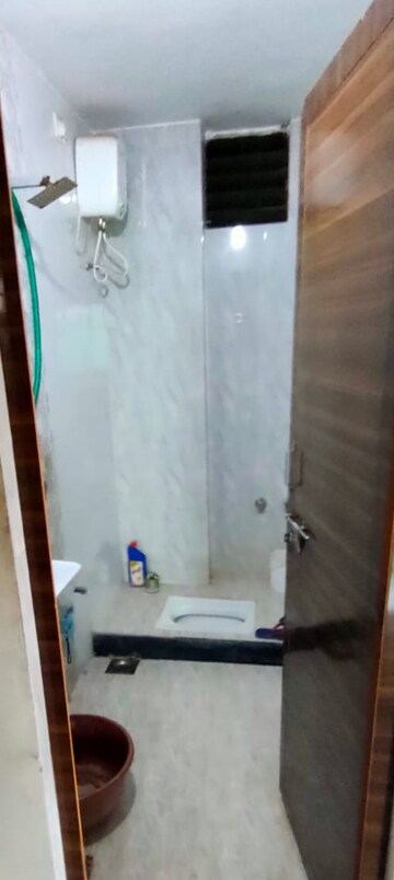 Bathroom in 3 BHK Apartment at Siddheswar Shree Shivanta Heritage, Kanbha – for Rent