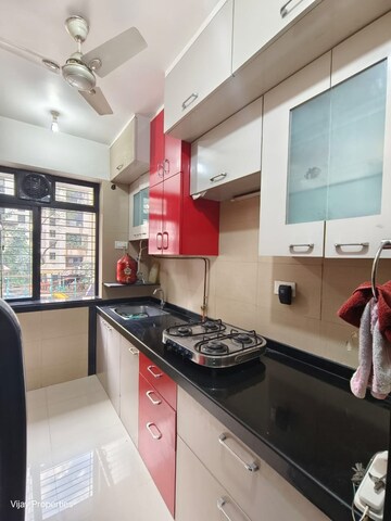 Kitchen in 1 BHK Apartment at Sheth Vasant Sagar Complex, Kandivali East – for Rent
