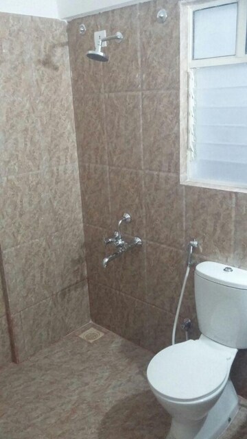 Bathroom in 2 BHK Apartment at Kolte Patil Cheryl, Kharadi – for Rent