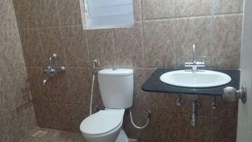 Bathroom in 2 BHK Apartment at Kolte Patil Cheryl, Kharadi – for Rent
