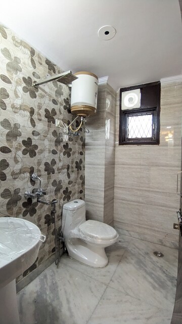 Bathroom in 2 BHK Builder Floor at Freedom Fighters Enclave – for Rent