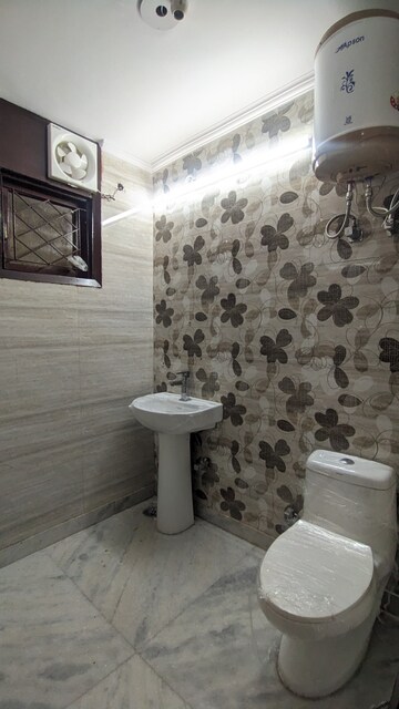 Bathroom in 2 BHK Builder Floor at Freedom Fighters Enclave – for Rent