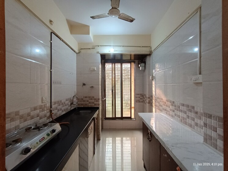 Kitchen, giriraj-classic 2 Bedroom 910 Sq.Ft. Apartment In Kopar Khairane Navi Mumbai 8064120