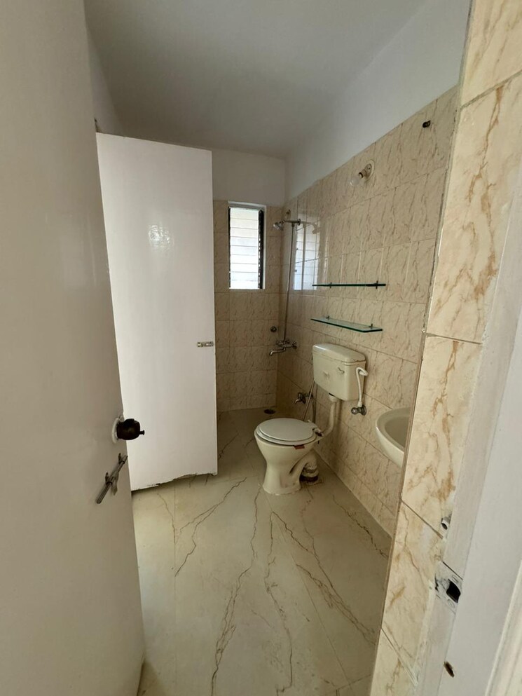 Bathroom, urban-nest 2 Bedroom 1200 Sq.Ft. Apartment In Undri Pune 8064148