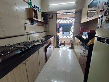 Kitchen in 2 BHK Apartment at Swapnalok Towers, Malad East – for Sale