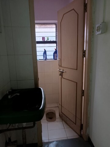 Bathroom in 2 BHK Apartment at Karve Nagar – for Rent