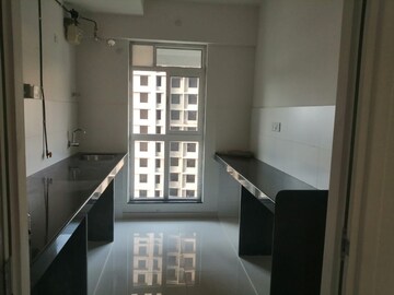 Kitchen in 2 BHK Apartment at Godrej Emerald, Ghodbunder Road – for Sale