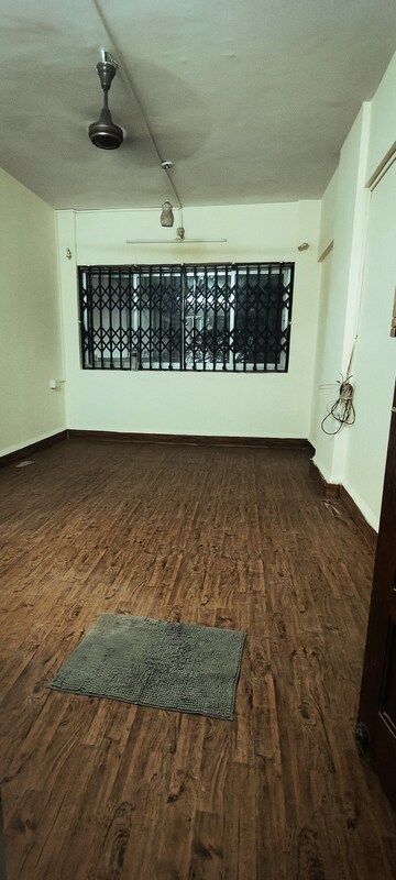 Bedroom in 1 BHK Apartment at Gaurav Niketan CHS, Borivali West – for Sale