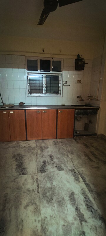 Kitchen in 1 BHK Apartment at Gaurav Niketan CHS, Borivali West – for Sale