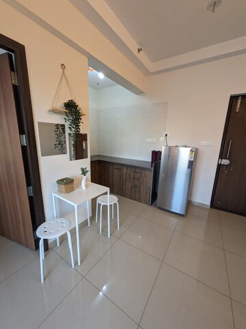 Living Room in 1 BHK Apartment at Duville Riverdale Suites, Kharadi – for Rent