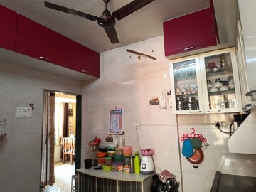 Kitchen in 2 BHK Apartment at 5P Manohar Shreeji Nirvana Phase I, Katrap – for Sale