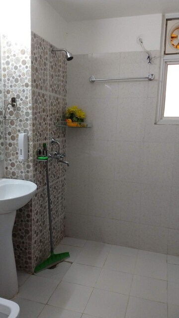 Bathroom in 2 BHK Apartment at Wall Rock Aishwaryam, Sector 16c Greater Noida – for Rent