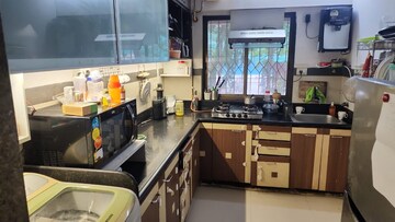 Kitchen in 2 BHK Apartment at Palash Towers, Andheri West – for Rent