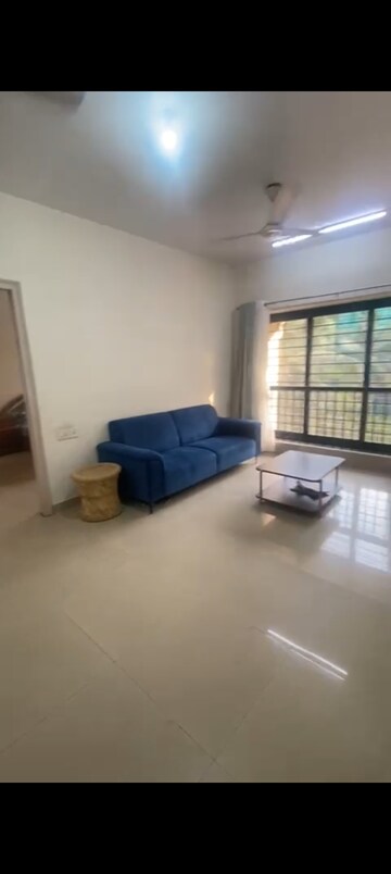Living Room in 2 BHK Apartment at K Raheja Palm Court, Malad West – for Rent